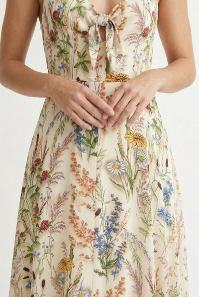 Model wearing the LOHNR Light Birch floral maxi dress